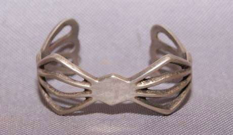 NAVAJO SILVER BRACELET: 1960s 70s sand cast design 4.75" x 1" x 1" Shipping charge are for the United States. The shipping on this lot is $10.00. Outside the United States there will be additional shipping fees. Unless noted
