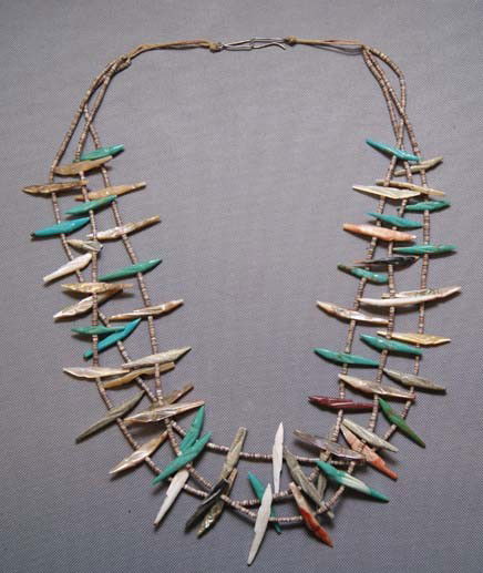 ZUNI FETISH NECKLACE: 1970's three strand bird fetishes made from abalone, turquoise and stone, 28" long Shipping charge are for the United States. The shipping on this lot is $10.00. Outside the United States there will b
