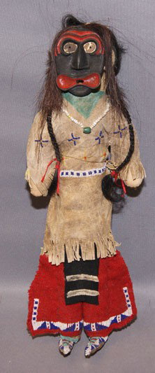 BEADED DOLL: contemporary, wearing false face society mask beaded design on hide 15 inches tall Shipping charge are for the United States. The shipping on this lot is $20.00. Outside the United States there will b