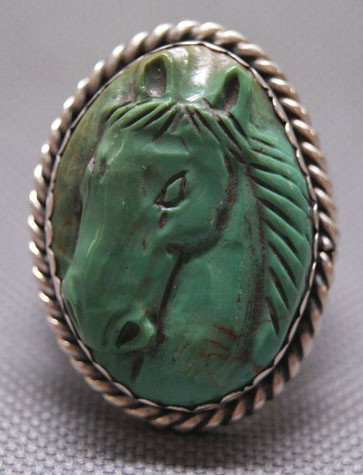NAVAJO RING: 1970s 80s stamped sterling silver with carved turquoise stone signed G, size 10.5 Shipping charge are for the United States. The shipping on this lot is $10.00. Outside the United States there will be