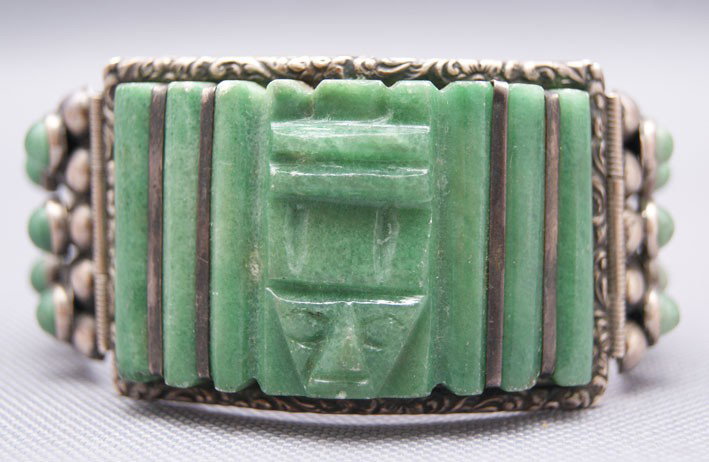 MEXICAN BRACELET: 1940s 50s carved face design marked Mexican sterling has old repair, 7" x 1.5" Shipping charge are for the United States. The shipping on this lot is $10.00. Outside the United States there will be ad