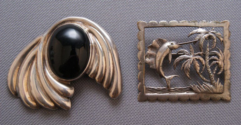 TWO PINS: 1960s 70s swordfish marked sterling 1.75" x 2", other marked 925 2" x 2.5" Shipping charge are for the United States. The shipping on this lot is $10.00. Outside the United States there will be additi