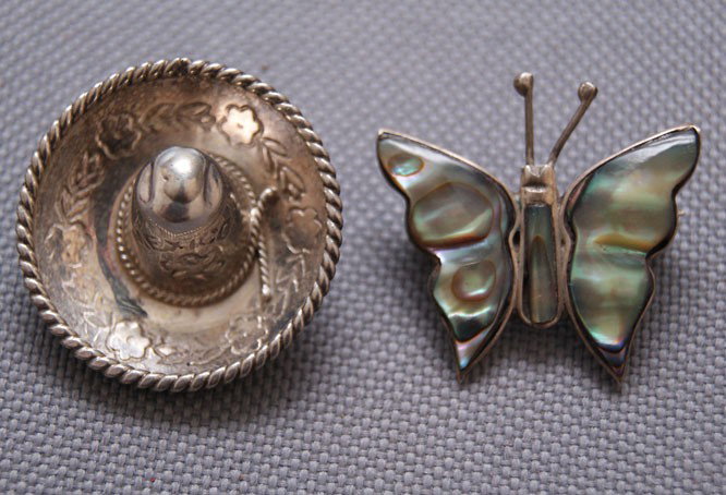 TWO MEXICAN PINS: 1960s 70s marked 925, butterfly .75" x 1", mini sombrero missing pin back .5" x 1" Shipping charge are for the United States. The shipping on this lot is $10.00. Outside the United States there will b
