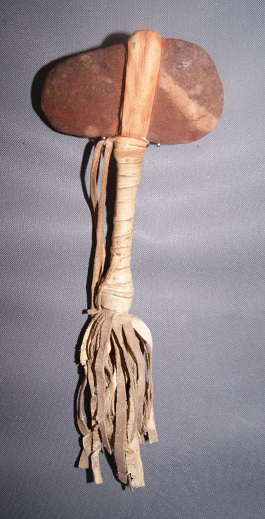 PLAINS DANCE CLUB: 1920s 30s rawhide wrapped handle with stone head, 13" x 5" including fringe Shipping charge are for the United States. The shipping on this lot is $10.00. Outside the United States there will be addit