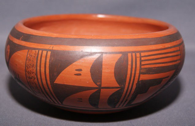 HOPI POTTERY BOWL: 1970s 80s black on red with minor pitting signed Etnel Youcalla, 3.25" x 7" Shipping charge are for the United States. The shipping on this lot is $10.00. Outside the United States there will be addit