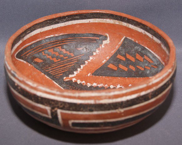 FOUR MILE POTTERY BOWL: prehistoric black and white on red with minor chips on rim, 3.5" x 7.5" Shipping charge are for the United States. The shipping on this lot is $10.00. Outside the United States there will be additiona