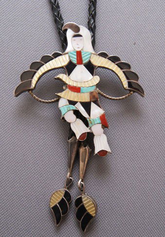 NAVAJO BOLO EAGLE DANCER: 1970s sterling silver stone to stone inlaid with stone inlaid tips. signed but unreadable, 3" x 3" Shipping charge are for the United States. The shipping on this lot is $10.00. Outside the United Sta