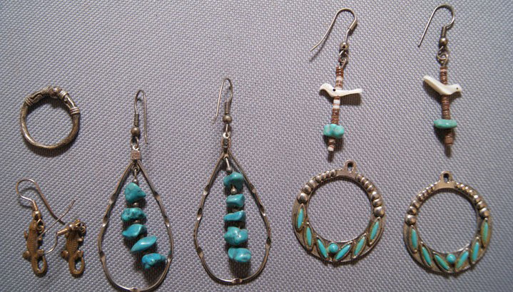 collection of earrings and ring: 1970s 80s four pairs of earrings largest pair 1" x 2", ring size 6 Shipping charge are for the United States. The shipping on this lot is $10.00. Outside the United States there will be additional shi