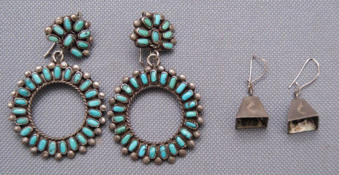 two pairs of Navajo earrings: 1960s 70s sterling silver bells with hand stamped design 1" x .5", sterling silver hoops with turquoise 2.25" x 1.25" Shipping charge are for the United States. The shipping on this lot is $10.00. Out
