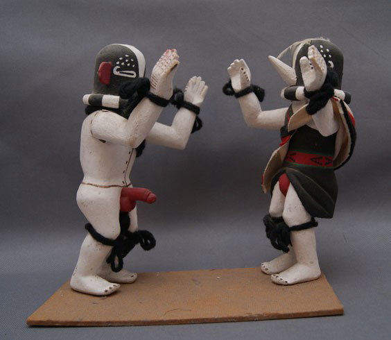 two Hopi kachinas: 1970s 80s hand carved and painted kokopelli with minor paint loss, 7.5" tall Shipping charge are for the United States. The shipping on this lot is $10.00. Outside the United States there will be addi
