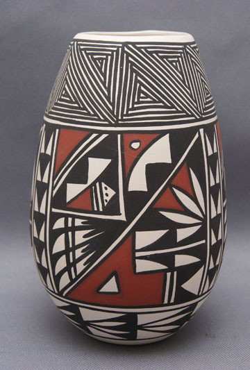 Acoma pottery jar: 1980s 90s Green wear hand painted Polychrome design signed dsa, 6.75" x 4.25" Shipping charge are for the United States. The shipping on this lot is $10.00. Outside the United States there will be add