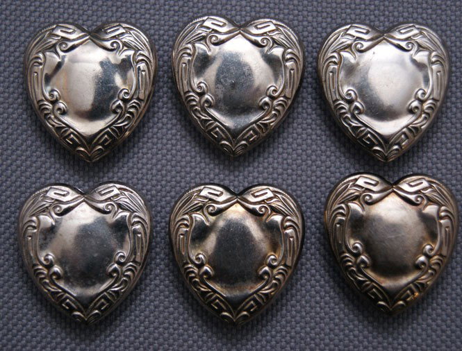 collection of button covers: 1970s 80s heart shaped, 1" x .75" Shipping charge are for the United States. The shipping on this lot is $10.00. Outside the United States there will be additional shipping fees. Unless noted all item