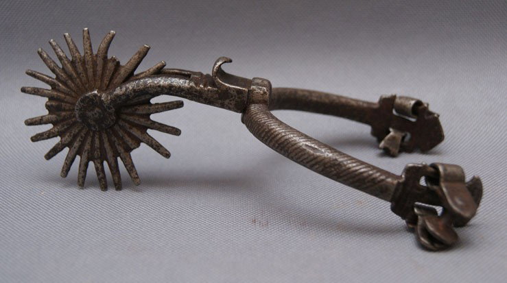 Mexican spur: 1880s 90s has traces of silver inlay, 6" x 3" Shipping charge are for the United States. The shipping on this lot is $10.00. Outside the United States there will be additional shipping fees. Unless no