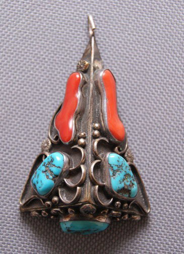 Navajo pendant: 1970s 80s sterling silver, turquoise and coral signed LG, 2.5" x 1.5" Shipping charge are for the United States. The shipping on this lot is $10.00. Outside the United States there will be additional 