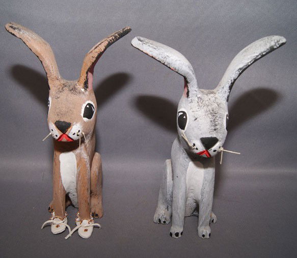 TWO NAVAJO FOLK ART FIGURES: 1989 carved rabbits by Hector Rascon one has broken foot, 9" x 5" x 3" Shipping charge are for the United States. The shipping on this lot is $10.00. Outside the United States there will be additional