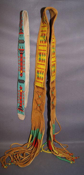 TWO PIECES PUEBLO BEADWORK: 1960, beaded belt and drop necklace, Both are loomed beaded on hide largest is 3" x 66" Shipping charge are for the United States. The shipping on this lot is $10.00. Outside the United States there w
