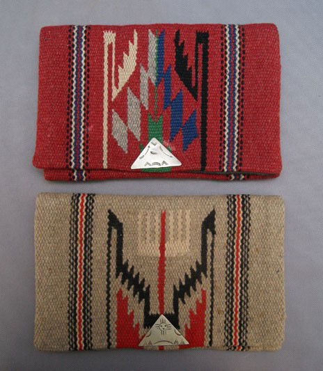 TWO CHUMAYO PURSES: 1940s, 50s, both have straps with hand stamped silver clasp, 5.5" x 9" Shipping charge are for the United States. The shipping on this lot is $10.00. Outside the United States there will be additional