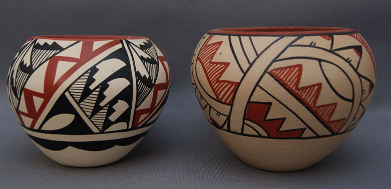TWO JEMEZ POTS: 1970's polychrome floral design signed M Toya, 3.5" x4.5" Shipping charge are for the United States. The shipping on this lot is $10.00. Outside the United States there will be additional shipping fee