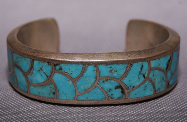 NAVAJO BRACELET: 1970s 80s sterling silver with channel inlaid turquoise signed H. Morgan 5" x .75" x 1" Shipping charge are for the United States. The shipping on this lot is $10.00. Outside the United States there w