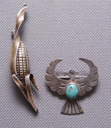 TWO NAVAJO PINS: 1970s 80s sterling silver corn signed with initials DR 2.5" x .5", bird has singled turquoise stone 1.25" x 1" Shipping charge are for the United States. The shipping on this lot is $10.00. Outside th
