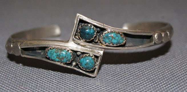 NAVAJO BRACELET: 1980s 90s sterling silver shadow box design with turquoise stones, 5" x .75" x 1" Shipping charge are for the United States. The shipping on this lot is $10.00. Outside the United States there will be