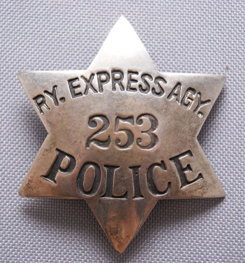 COPY OF RAILWAY EXPRESS BADGE: 1960s-70s sterling silver marked, RL ILL. 2.5"x 3" The shipping on this lot is $10.00.