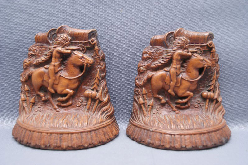 WESTERN BOOKENDS: 1960s-70s molded from plaster one with minor chip on edge, 5"x2''x5" The shipping on this lot is $10.00.
