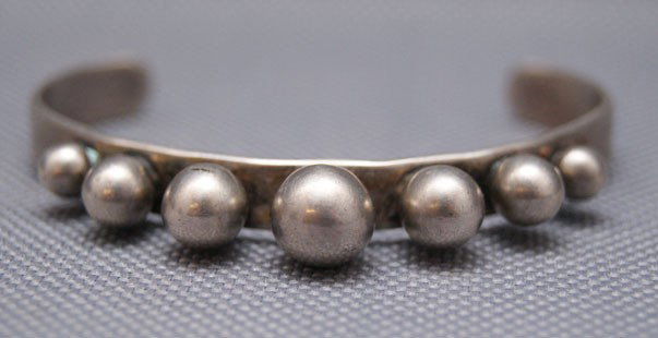 MEXICAN BRACELET: 1970s 80s marked taxco .980, 3.5" x .25" x 1.25" The shipping on this lot is $10.00.
