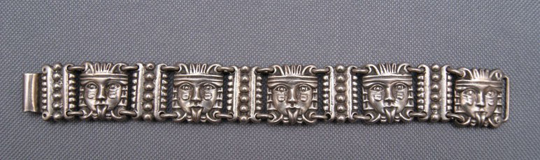MEXICAN BRACELET: 1960s 70s sterling silver link style marked Mexico Rieto, 7.25" x 1" The shipping on this lot is $10.00.