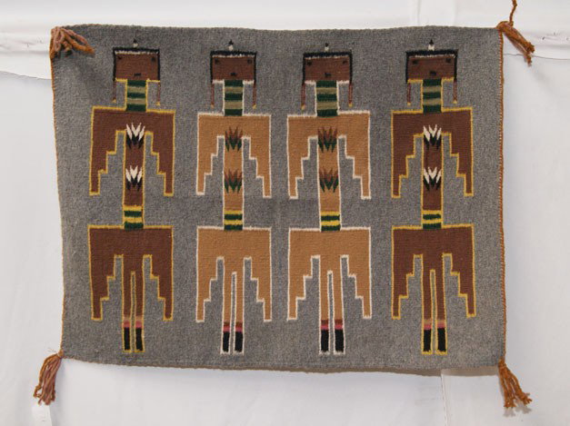 NAVAJO TEXTILE: 1970s 80s handwoven four figure yei, 20" x 27" The shipping on this lot is $10.00.