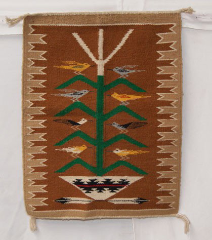 NAVAJO TEXTILE: 1970s 80s handwoven tree of life, 21" x 16" The shipping on this lot is $10.00.