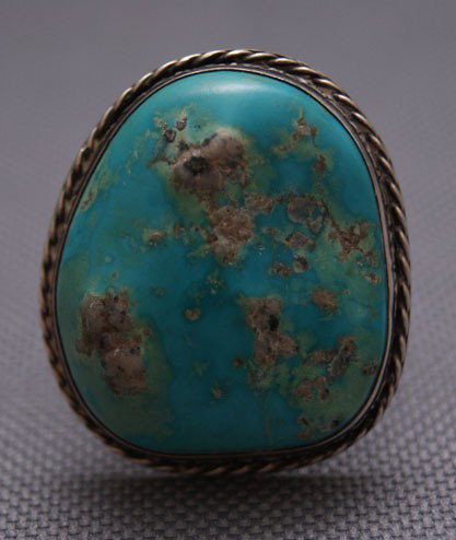 NAVAJO RING: 1970s 80s sterling silver with turquoise stone, size 9.25 The shipping on this lot is $10.00.