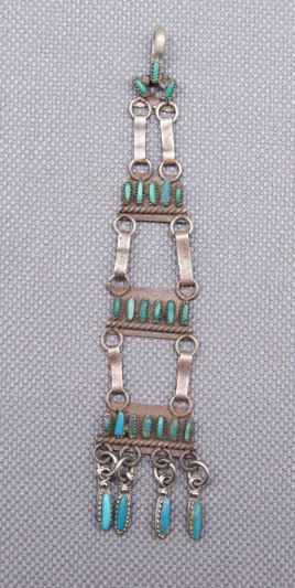ZUNI SILVER NECKLACE: 1950s sterling silver and needlepoint turquoise, 4" long Shipping charge are for the United States. The shipping on this lot is $10.00. Outside the United States there will be additional shipping fees