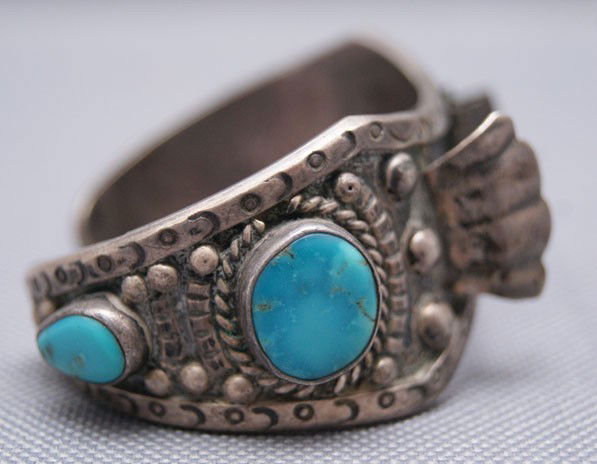 MEXICAN SILVER WATCH BAND: 1950s sterling silver and turquoise signed with Bell logo, 4.75 x 1" x .75 Shipping charge are for the United States. The shipping on this lot is $10.00. Outside the United States there will be additi