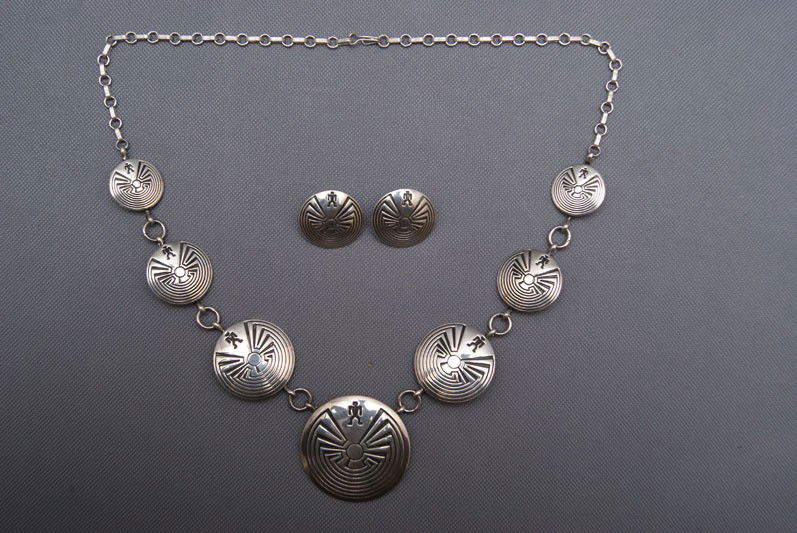 NAVAJO SILVER NECKLACE AND EARRINGS: 1980s man in the maze design with matching earrings, 23" long Shipping charge are for the United States. The shipping on this lot is $10.00. Outside the United States there will be additional shipping