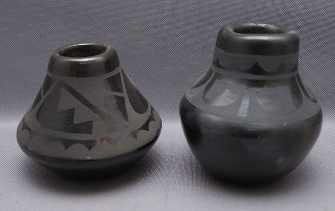 TWO SAN ILDEFONSO POTS: 1970s, matt on Black design, one by Alice Martinez, one by Lucy Martinez, largest 3.5" x 3.5" Shipping charge are for the United States. The shipping on this lot is $10.00. Outside the United States t