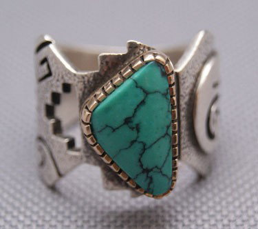 HOPI SILVER RING: 1990s sterling silver and turquoise design signed with turtle logo and MS for Mitchell Sockyman, size 10 Shipping charge are for the United States. The shipping on this lot is $10.00. Outside the Unit