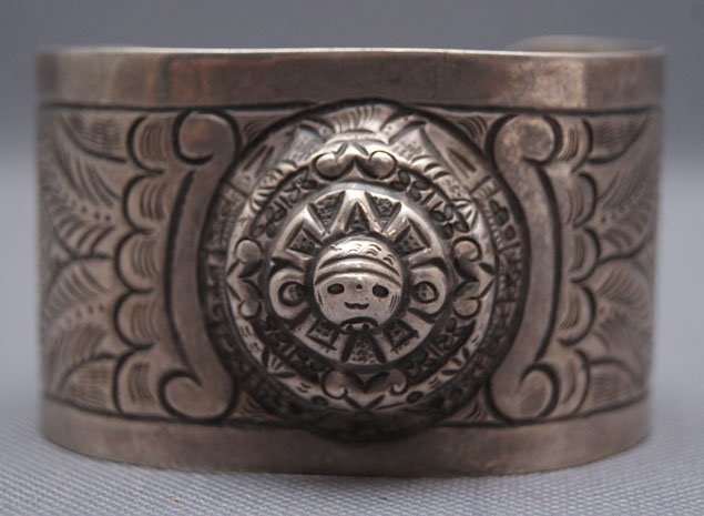 MEXICAN BRACELET: 1940s, 50s sterling silver stamped and bump out design, marked Mexico, 1.5" x 5.5" x 1.5" Shipping charge are for the United States. The shipping on this lot is $10.00. Outside the United States there