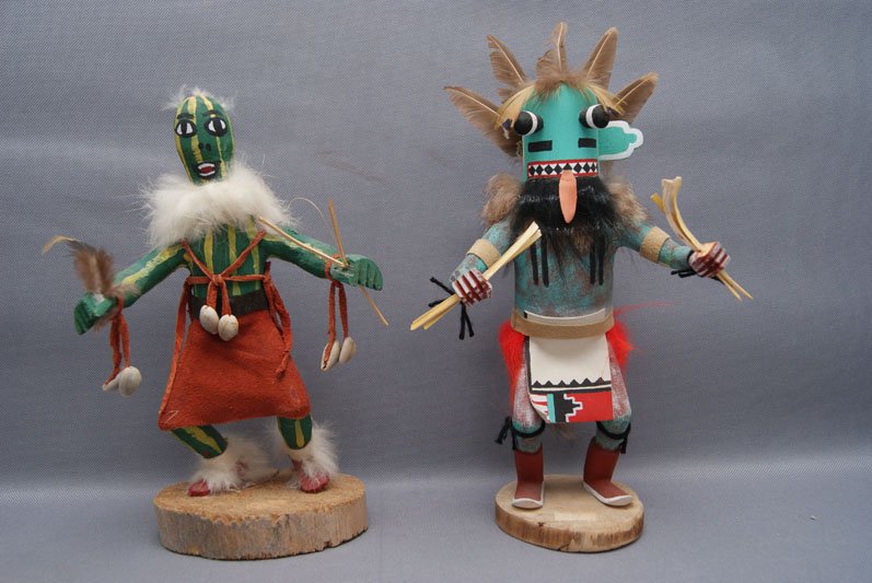 TWO NAVAJO KACHINAS: 1970s, 80s, hand carved and painted squash, and salamander, largest 9" tall Shipping charge are for the United States. The shipping on this lot is $10.00. Outside the United States there will be addit