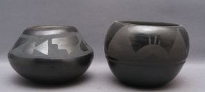 TWO SANTA CLARA POTS: 1980s 90s matte on black design with minor surface scratches, large one signed Marie A 2.75" x 3.5", small one signed in pencil Juan Marten 2.25" x 3.75" Shipping charge are for the United States. The