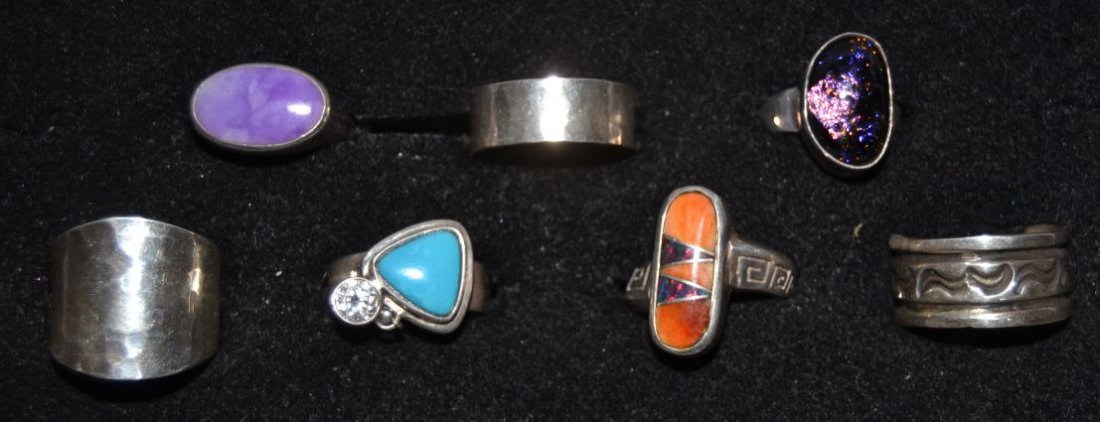 SEVEN RINGS: 1980s 90s sterling silver some have stones largest size 8 Shipping charge are for the United States. The shipping on this lot is $10.00. Outside the United States there will be additional shipping fee