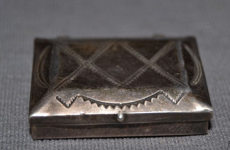 NAVAJO STERLING SILVER PILL BOX: 1960s 70s stamped design .25"x1"x1.5" Shipping charge are for the United States. The shipping on this lot is $10.00. Outside the United States there will be additional shipping fees.