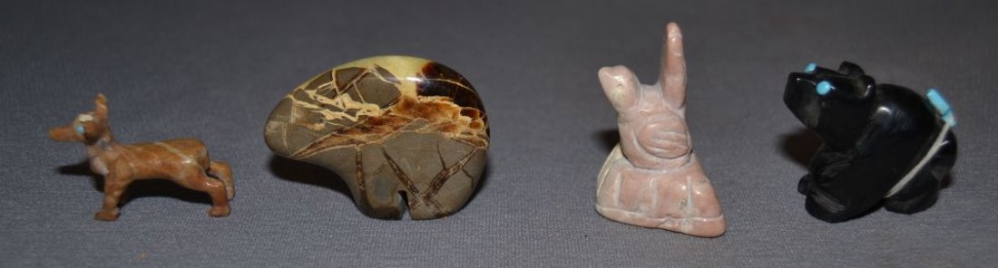 FOUR PUEBLO FETISHES: 1980s 90s hand carved largest 1.5"x2"x.5" Shipping charge are for the United States. The shipping on this lot is $10.00. Outside the United States there will be additional shipping fees.