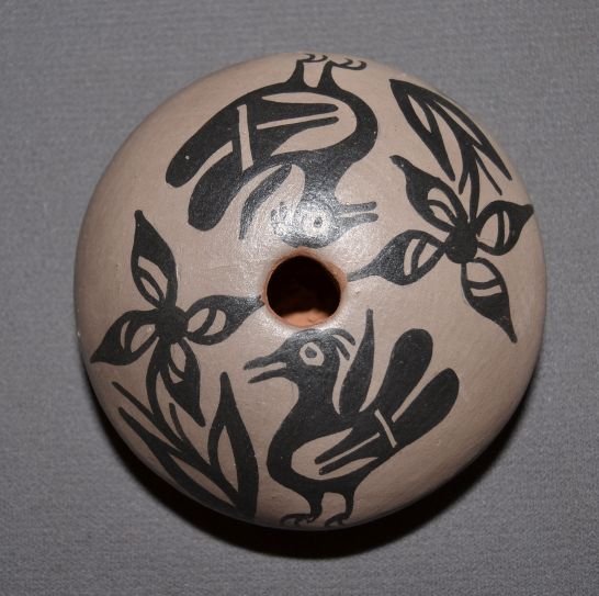 SANTO DOMINGO SEED POT: 1980s 90s black on cream bird and floral design signed AMTL 1.25"x3.5" Shipping charge are for the United States. The shipping on this lot is $10.00. Outside the United States there will be additional