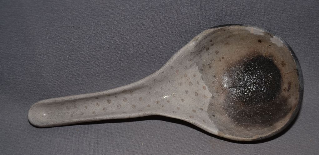 ANASAZI POTTERY LADLE: prehistoric black on white spotted design has been cracked and glued handle is plaster 11"x2"x4.5" Shipping charge are for the United States. The shipping on this lot is $20.00. Outside the United Sta