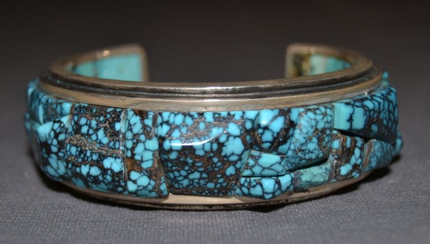 NAVAJO BRACELET: 1980s 90s sterling silver turquoise inside and out high grade spider web on outside 6"x1.1"x1.5" Shipping charge are for the United States. The shipping on this lot is $20.00. Outside the United State