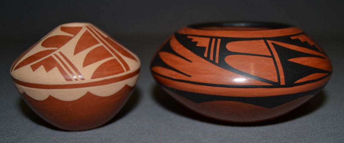 2 JEMEZ POTS: 1980s 90s largest black on red signed G. Sandia 2"x4.5" smallest buff on red signed G. Sandia 2.25"x3" both have minor rubbing Shipping charge are for the United States. The shipping on this lot is $1