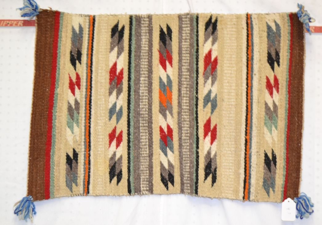 DOUBLE SIDED NAVAJO TEXTILE: 1960s 70s hand woven banded pattern on one side striped on other 34"x23" Shipping charge are for the United States. The shipping on this lot is $10.00. Outside the United States there will be addition