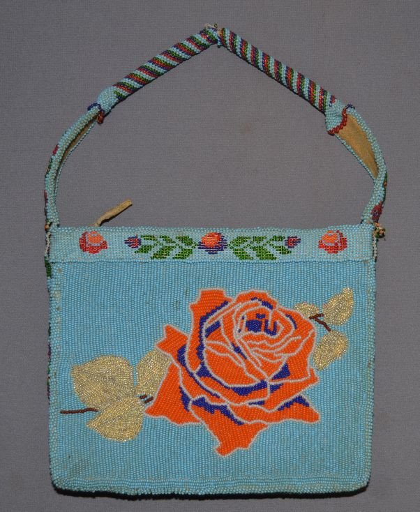 PLAINS/CROW BEADED PURSE: 1940s 50s fully beaded floral design has missing beads damage on handle 7.25"x8.75"x1.5" not including handle Shipping charge are for the United States. The shipping on this lot is $15.00. Outside the