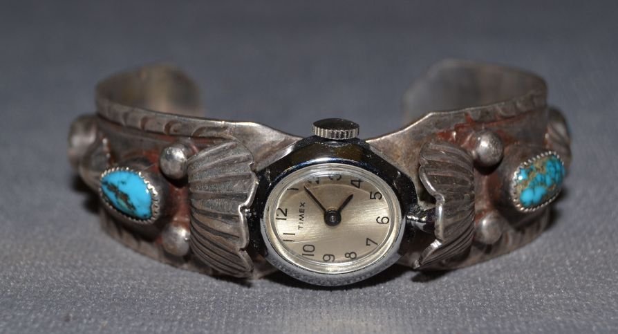 NAVAJO SILVER WATCH BAND: 1960s 70s sterling silver 4 turquoise stones 5"x.8"x1.2" Shipping charge are for the United States. The shipping on this lot is $10.00. Outside the United States there will be additional shipping fees